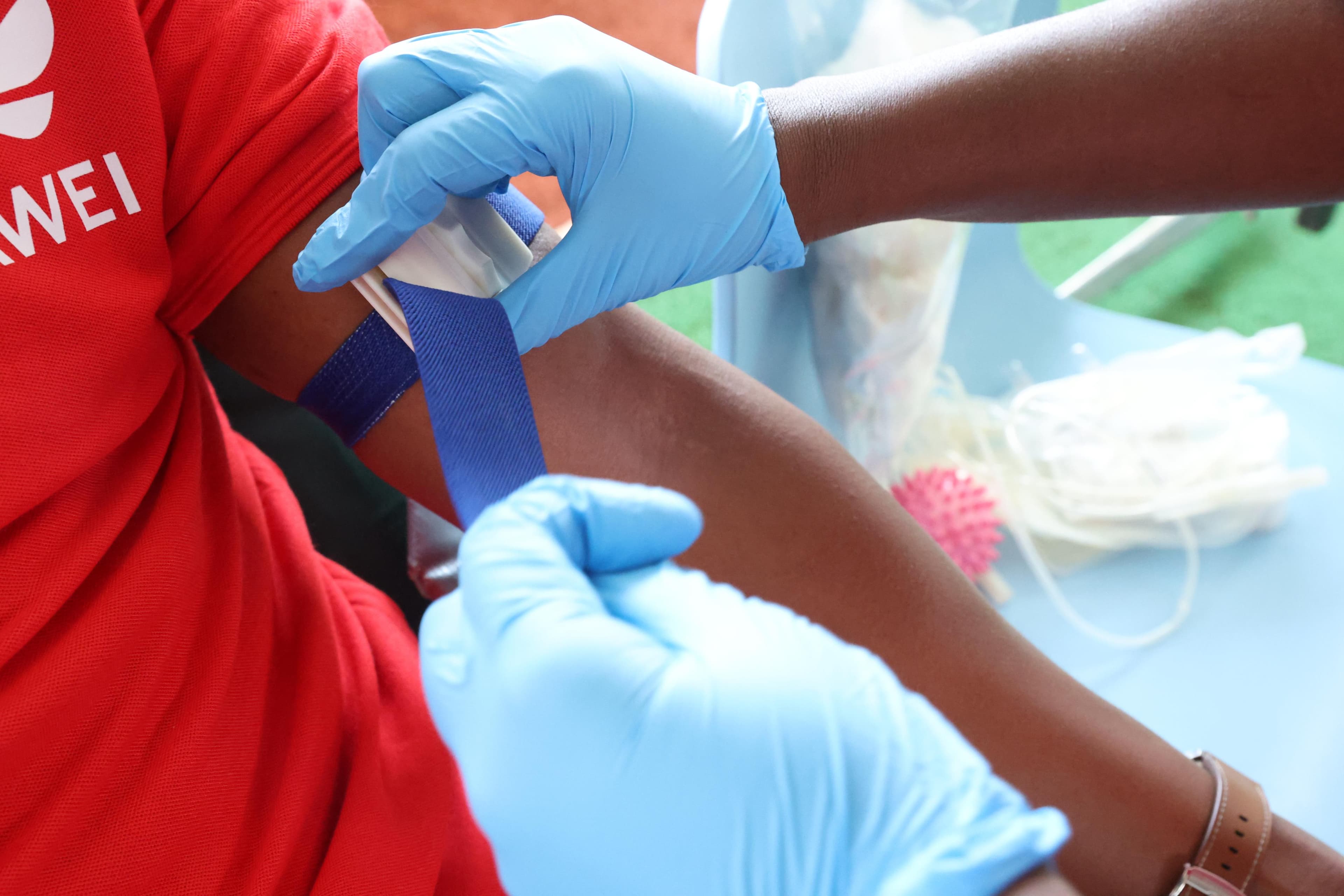 Smiling blood transfusion recipient