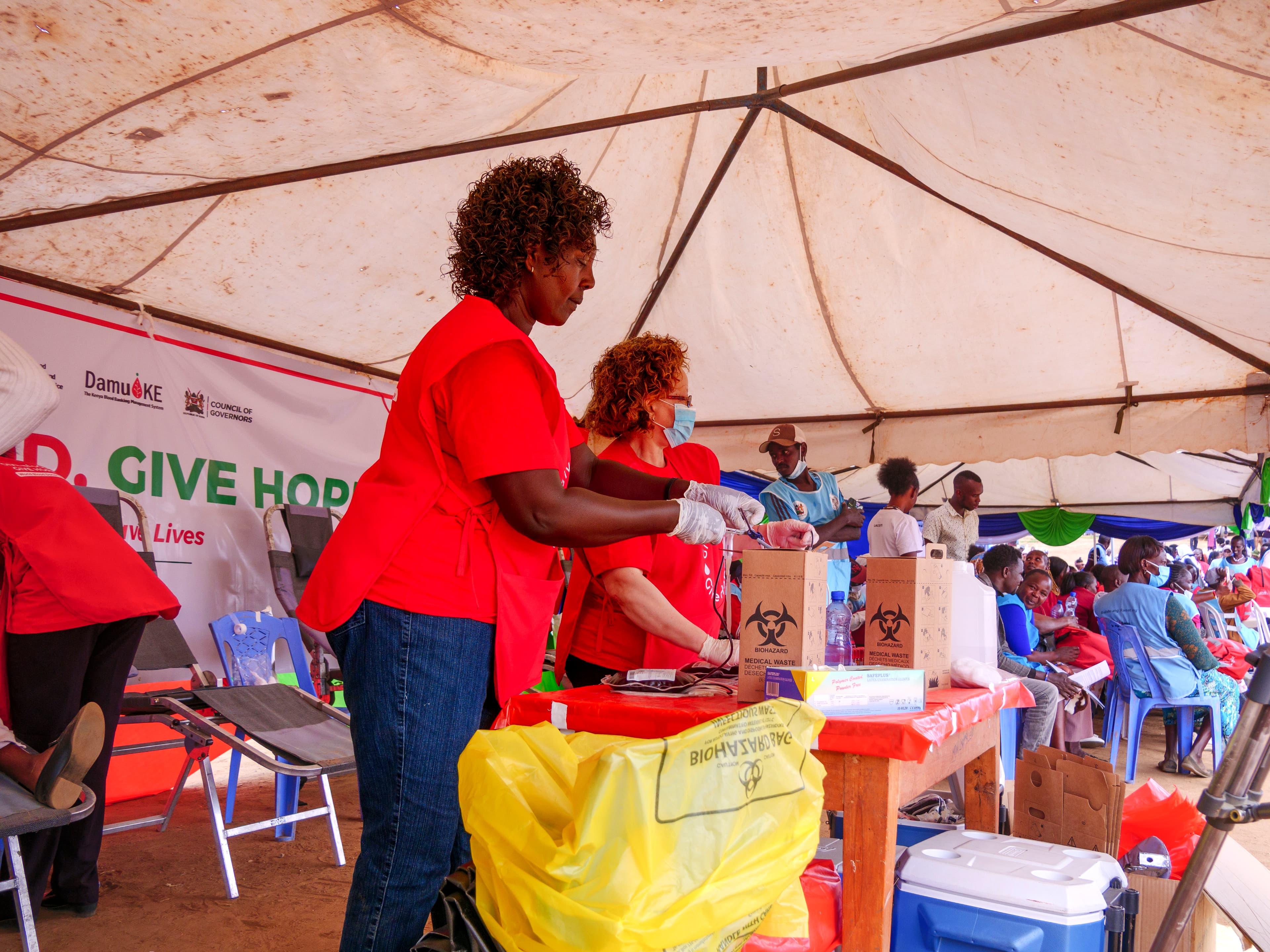 Medics with Donors unpacking Supplies